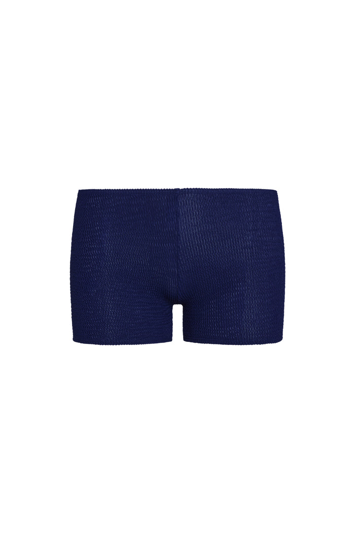Front view of Cali Short in Midnight Crinkle showing low rise mid-thigh cut and textured crinkle fabric on white background