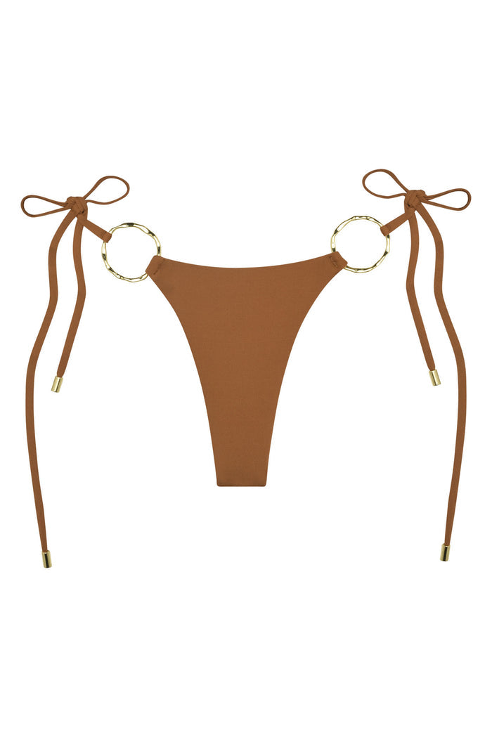 Front view of Cannes bottom in caramel, high-cut with gold ring side hardware and adjustable tie straps on white background