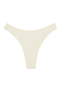 Flat lay of Capri Thong in Ivory showcasing seamless minimal-coverage design on white background