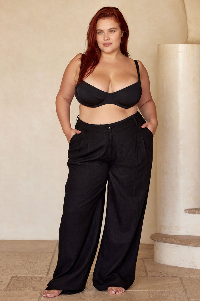 Front view of Casablanca Pant in black on model showing high-rise wide-leg linen-blend trousers with front pleats