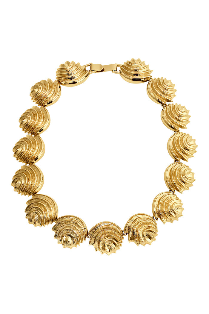 Gold statement collar necklace of textured scallop fan links connected by a box clasp