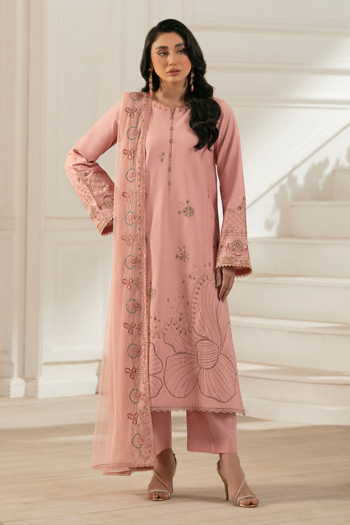 NAQSHI Chamak front: light‑pink straight‑cut cambric shirt with round neckline, subtle front slits and unique handmade buttons paired with straight cambric pants