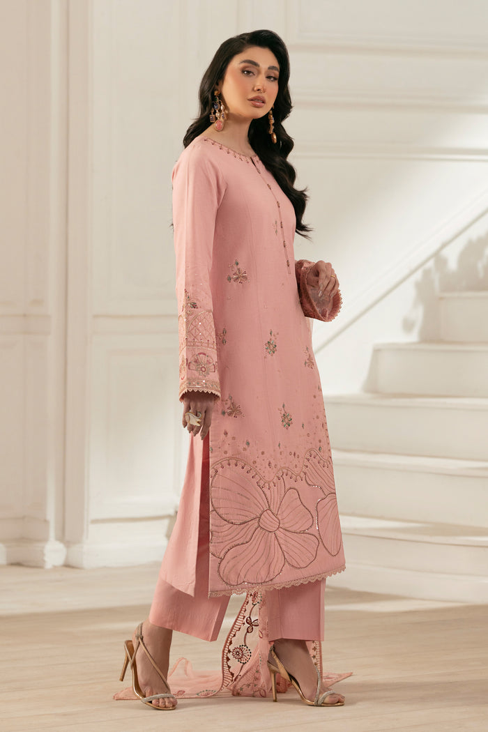 Side view of NAQSHI Chamak showcasing embroidered and sequin‑adorned sleeve border, lace‑finished hem and fluid drape of cambric fabric