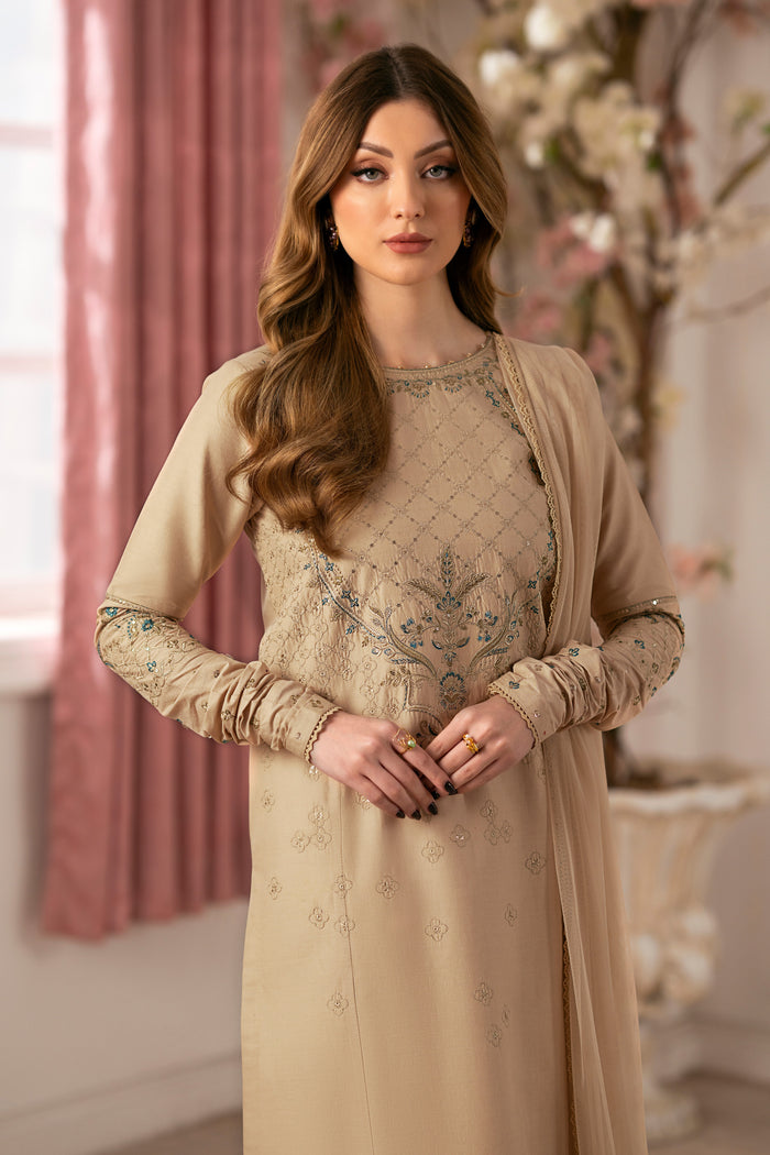 Detailed shot of NAQSHI Chamkeeli sleeve cuff with floral embroidery, shimmering sequins and scalloped lace edge on beige cambric