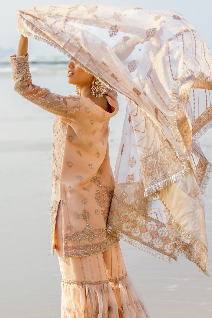Macro of Chandni shirt bodice highlighting heavy hand‑adda embellishments comprising sequin, naqshi, dabka, cuts and minimal lace motifs