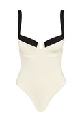 Cream one-piece underwire swimsuit with black shoulder straps and black upper-cup trim, V-shaped center detail