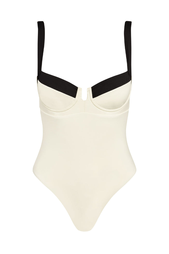 Cream one-piece underwire swimsuit with black shoulder straps and black upper-cup trim, V-shaped center detail