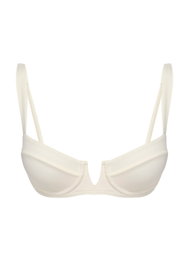 Front view of Clovelly Top in ivory showing underwire plunge cups and thin adjustable straps on white background