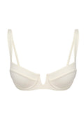 Front view of Clovelly Top in ivory showing underwire plunge cups and thin adjustable straps on white background