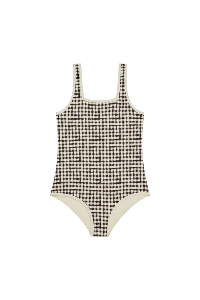 Front view of Corfu One Piece Kids in black gingham showcasing square neckline and contrast binding on white background
