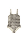 Front view of Corfu One Piece Kids in black gingham showcasing square neckline and contrast binding on white background