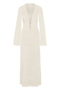 Front view of Corossol Dress, ivory lace crochet; lace-up plunging neckline and long flared sleeves on white background