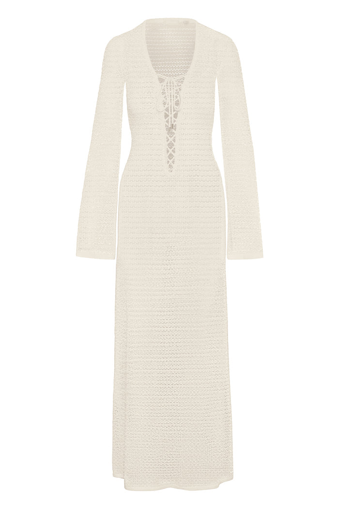 Front view of Corossol Dress, ivory lace crochet; lace-up plunging neckline and long flared sleeves on white background