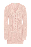 Front view of Corossol mini dress in powder pink petit crochet with open-knit fabric and lace-up V-neck tassels on white background
