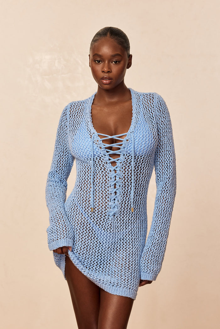 Front of Corossol Mini Dress in Sky Petit Crochet showing lace-up neckline with gold-tipped ties and sheer crochet knit