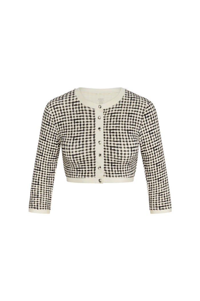 Front view of Crete Swim Cardi in black gingham with cropped button-front, cream trim and long sleeves on white backdrop