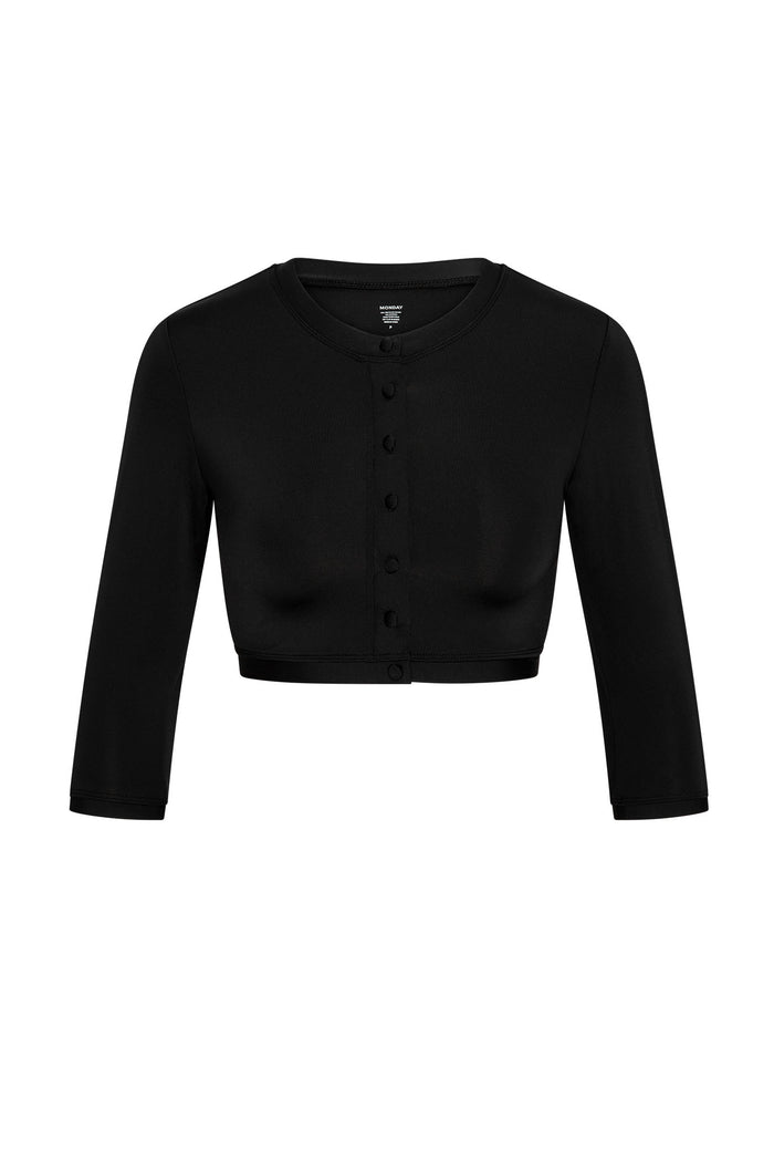 Front view of Crete Swim Cardi in black showing cropped length, button-front closure and three-quarter sleeves on white background