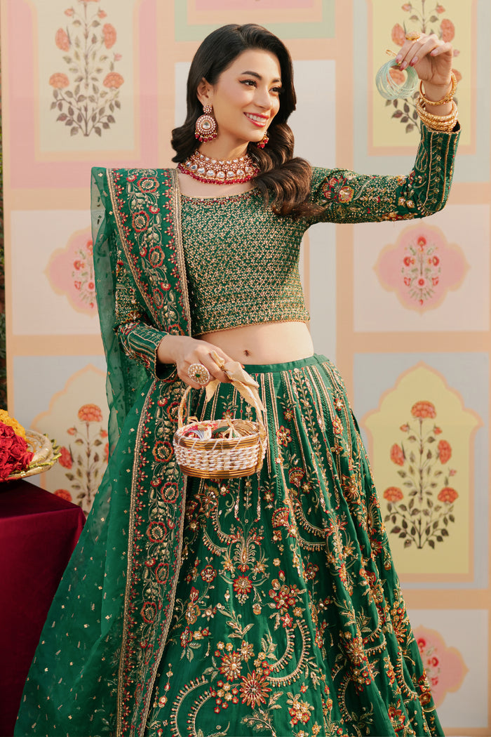 Close‑up of NAQSHI Danir sleeve highlight: intricate multi‑colored thread embroidery, hand‑adda work with sequin and stone highlights on raw‑silk.