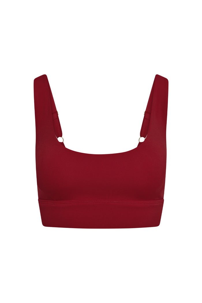 Front view of Devin Bra in cherry showing scoop neckline and thick adjustable straps with gold ring hardware on a white background