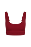 Front view of Devin Bra in cherry showing scoop neckline and thick adjustable straps with gold ring hardware on a white background