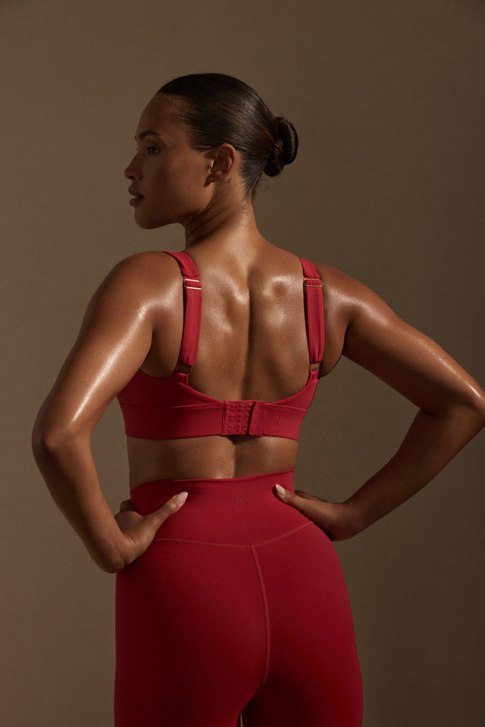 Rear view of Devin Bra in cherry showing adjustable shoulder straps and 3-row hook-and-eye back closure on neutral background