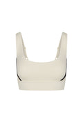 Front view of The Devin Bra in ivory with black side piping, scoop front, adjustable wide straps and elastic underband