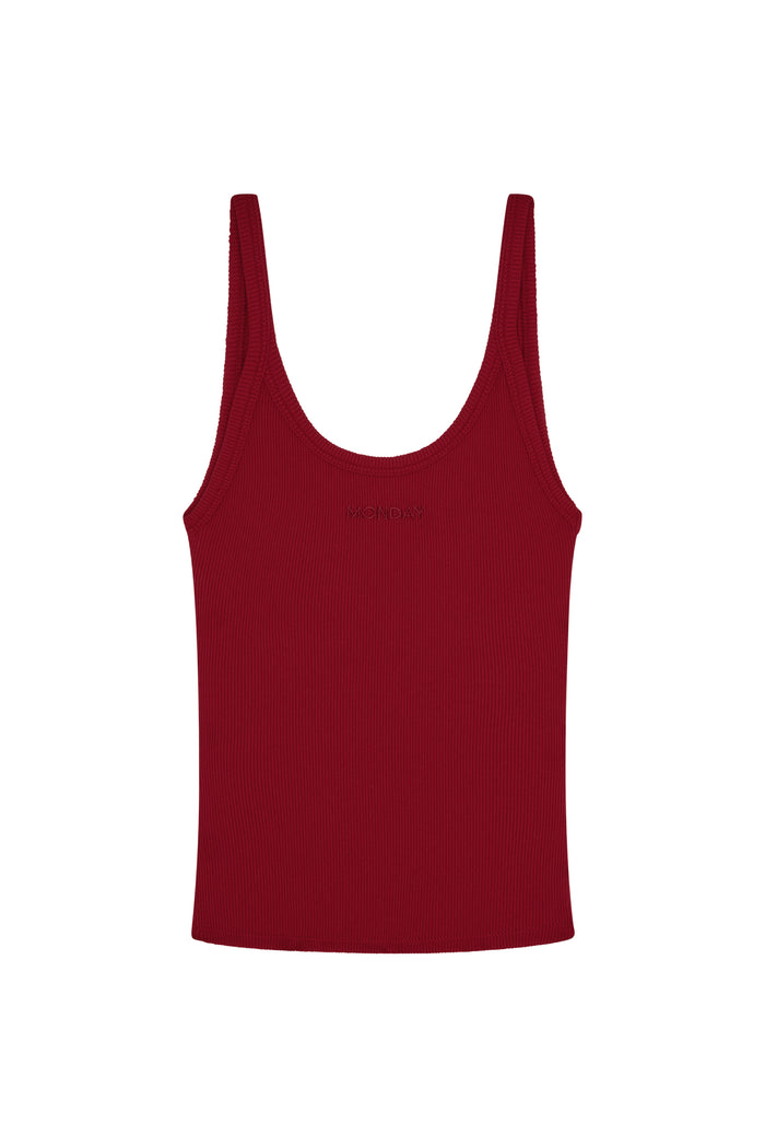 Front view of Devin Tank in cherry thin rib showcasing scoop neckline and embroidered MONDAY logo on white background