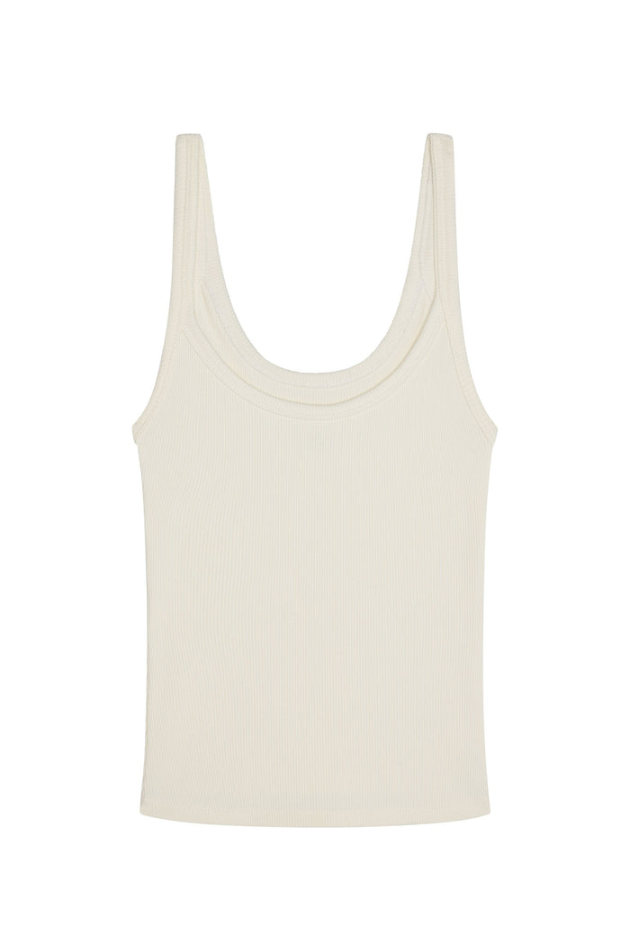 Flat-lay of Devin Tank Long showing scoop neckline and thin ribbed texture in ivory on white background
