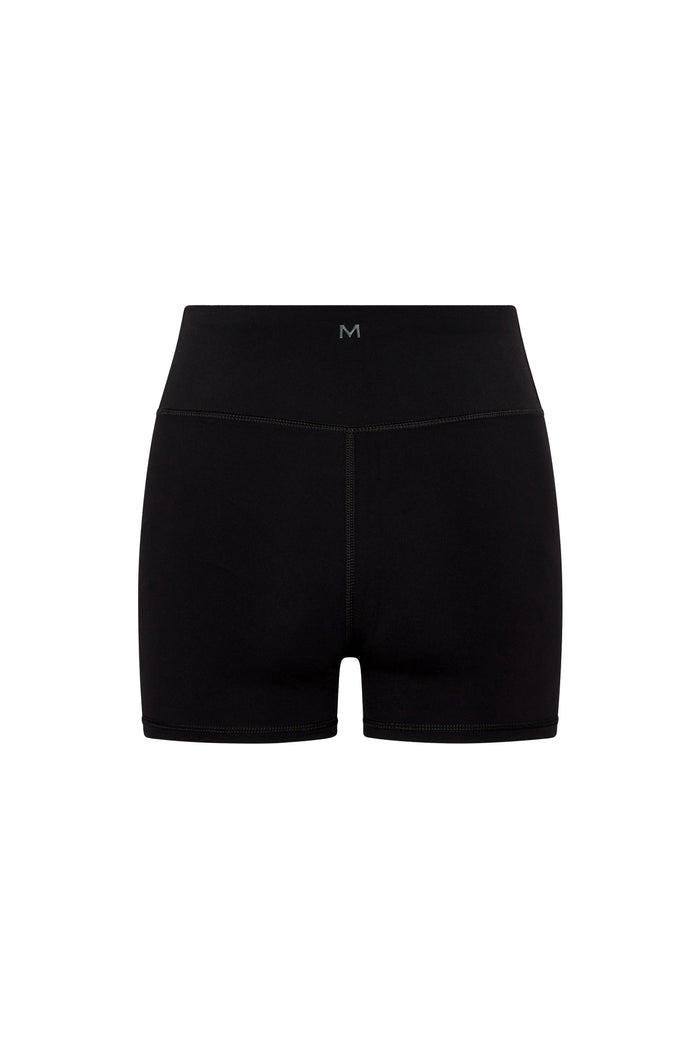 Rear view of Elysian Short 4.5-inch in black showcasing high-rise waistband with centered M logo on white background