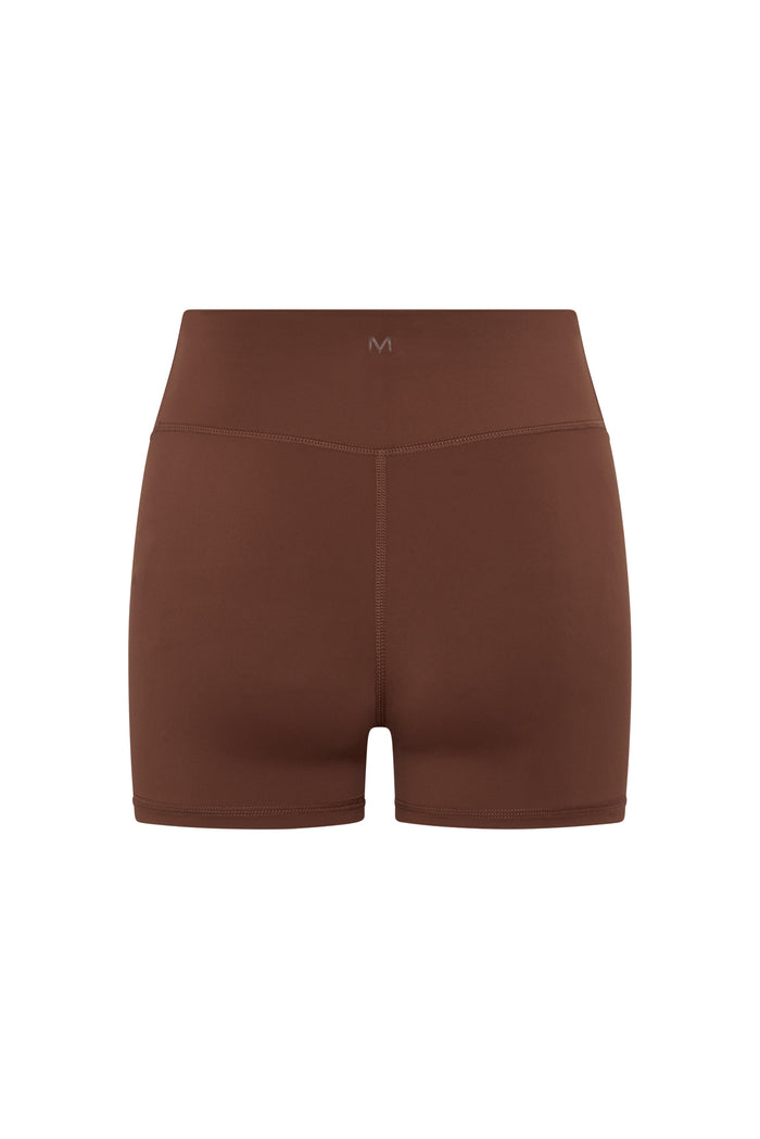 Back view of Elysian Short 4.5-inch in Cliffside brown showing high-rise waistband and center back seam on white background