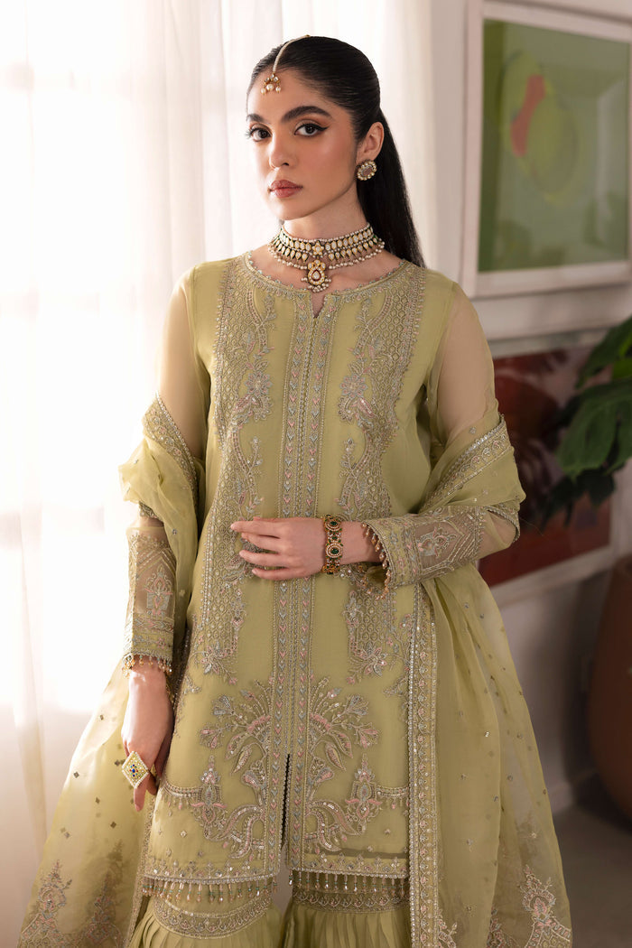 Close‑up of naqshi eraj shirt mid panel displaying intricate sequin and thread embroidery pattern with minimal lace trim accent.