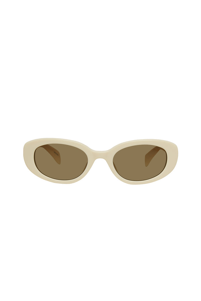 Ivory oval sunglasses with thick frame and brown lenses, front view on white background