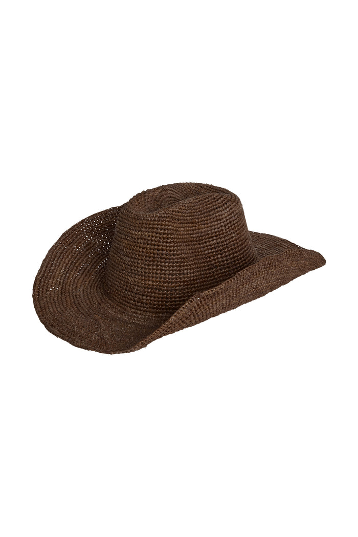 Three-quarter view of Exuma Raffia Hat in espresso showcasing woven raffia texture and wide floppy brim on white background