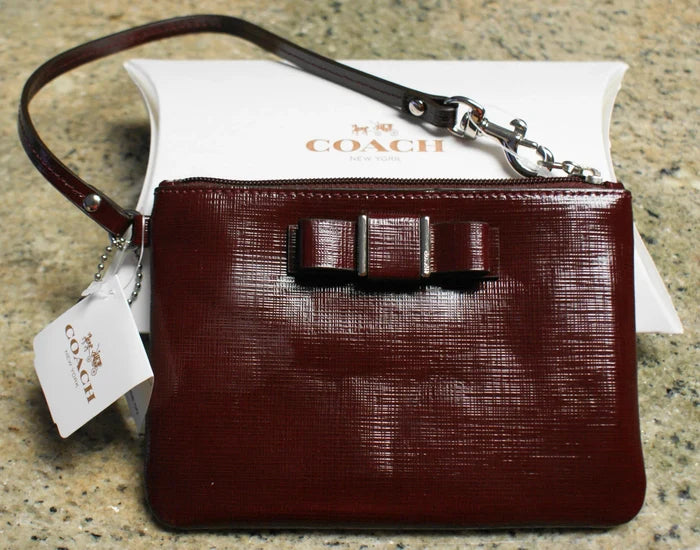 Coach F52137 Darcy Patent Bow Small Wristlet – Sherry Women's Designer Handbag, New