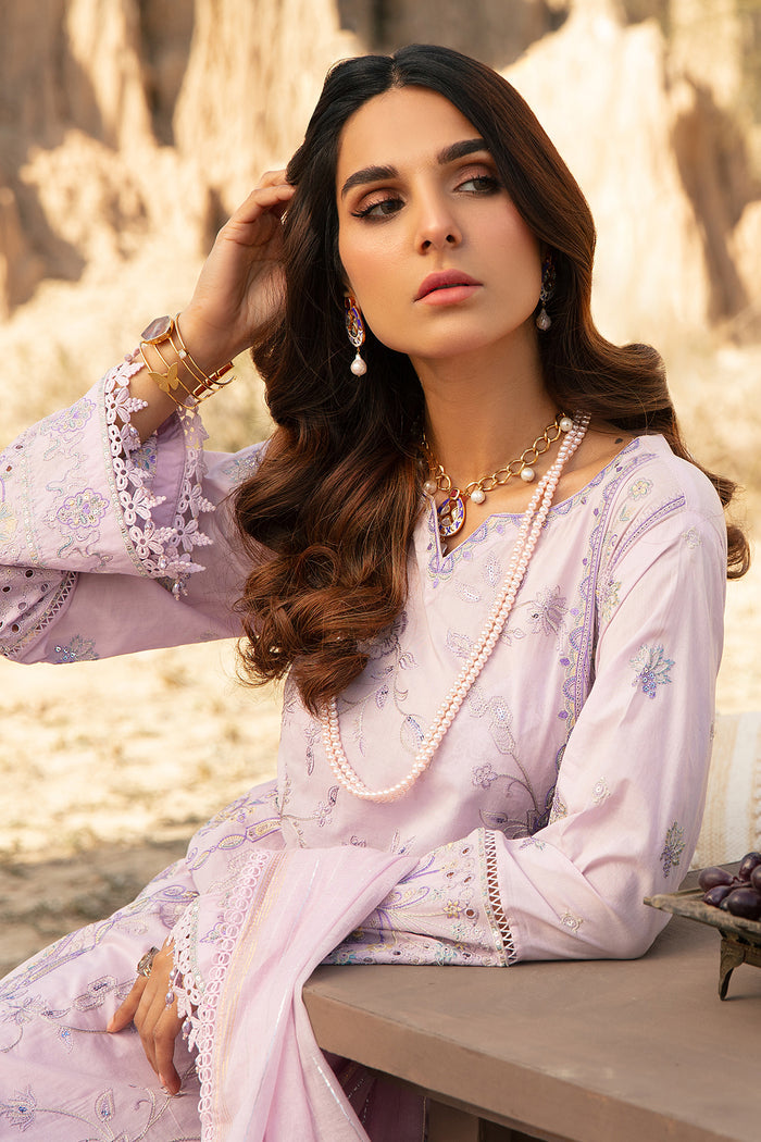 Portrait close up of embroidered neckline and sleeve lace detailing on lavender lawn shirt women party wear outfit