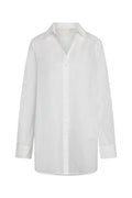 Front view of Fiji Tunic in white showing semi sheer cotton voile, button front closure and tunic length with side slits on white background