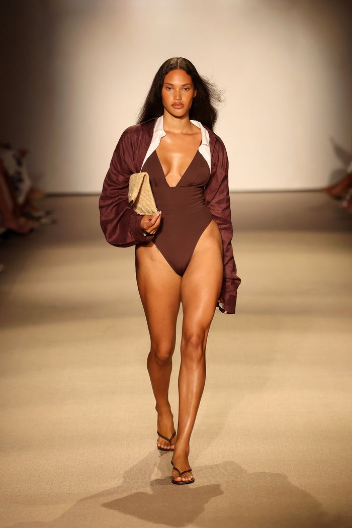 Front view of La Jolla linen shirt in espresso showcasing oversized open fit, long sleeves and linen texture on runway