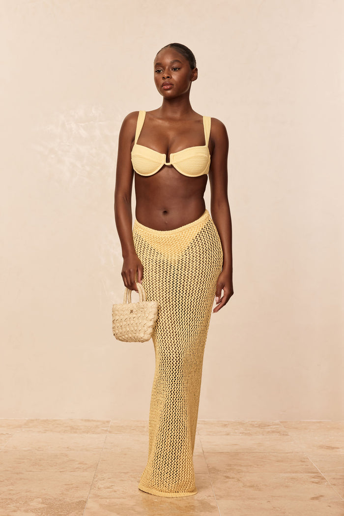 Full-length front view of Fontelina Skirt in Honey Petit Crochet showcasing crochet knit sheer maxi fit on model against neutral background