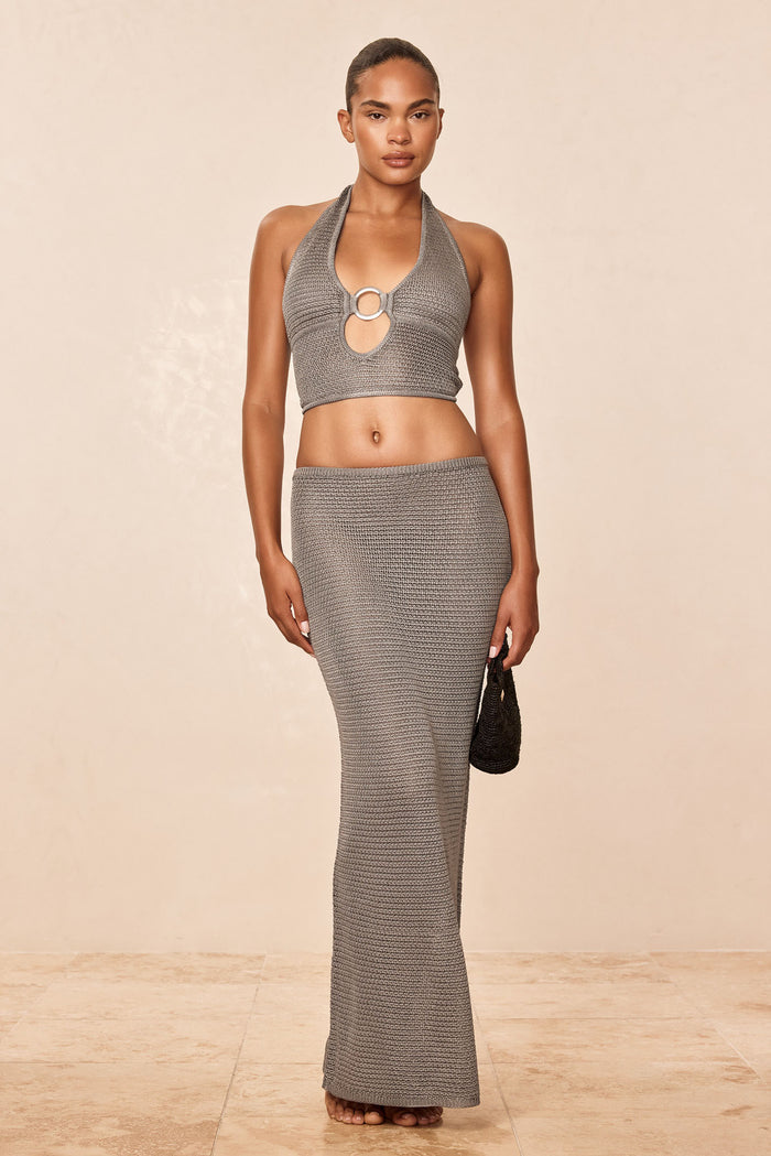 Front view of Fontelina skirt in Steel treble knit on model, showing textured knit, high-rise slim fit and ankle-length