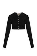 Black cropped cardigan with long sleeves and front pearl buttons; label reads MONDAY
