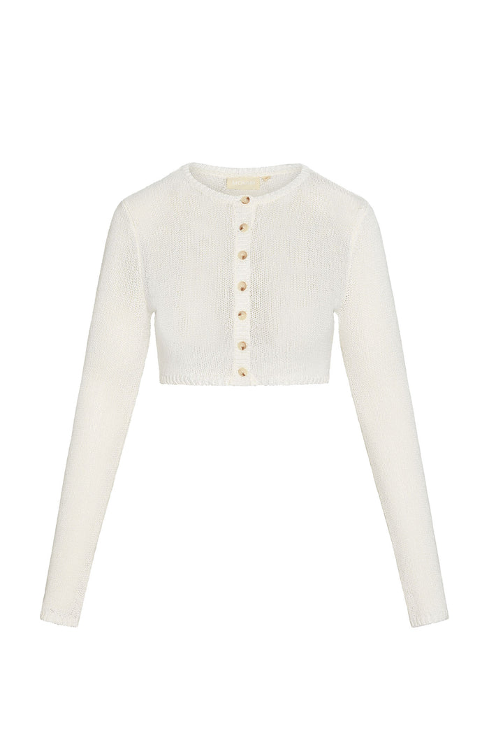 Cropped cream knit cardigan with long sleeves, round neck and center wooden buttons; label reads 'MONDAY'.