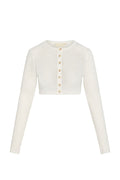 Cropped cream knit cardigan with long sleeves, round neck and center wooden buttons; label reads 'MONDAY'.