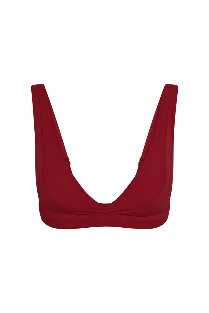 Front view of Glacier Bra in Cherry showcasing twist-front V-neckline, wide adjustable straps, and underband on white background
