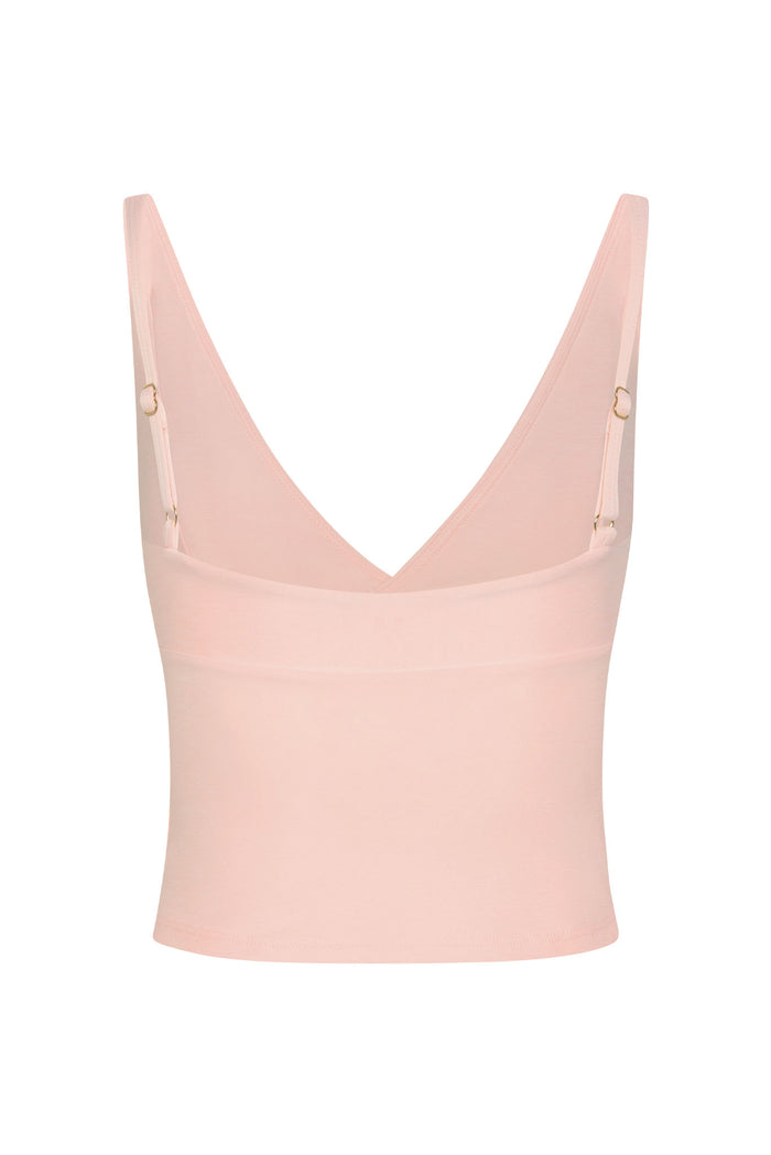 Back view of Glacier Tank in Heather Powder Pink showing deep V back and adjustable gold ring shoulder straps on white background
