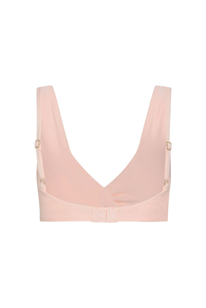 Front view of Griffith Bra in Heather Powder Pink showing V-neck twist, adjustable shoulder straps and 3-hook back on white background