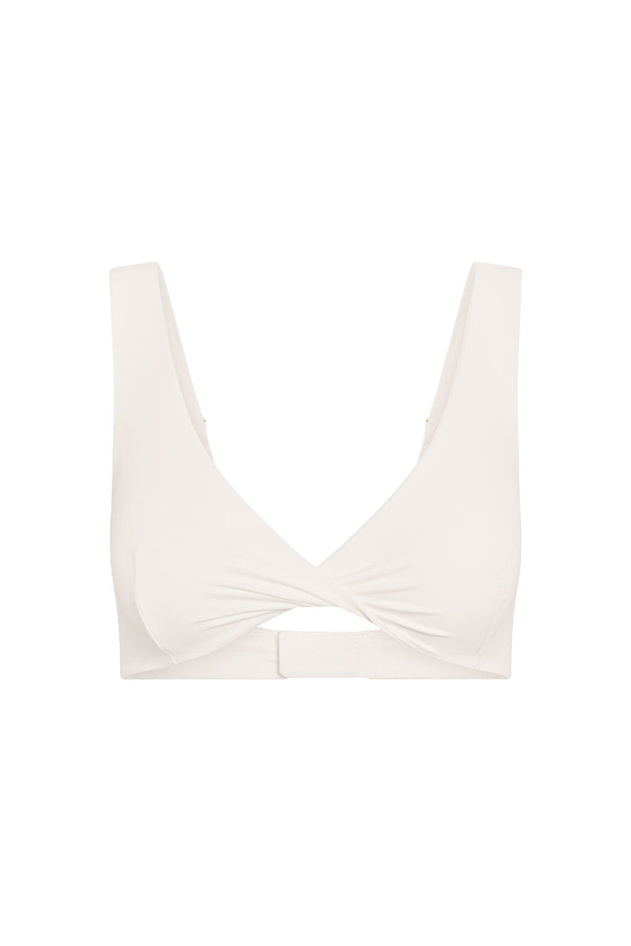 Front view of Griffith Bra in ivory showing twist-front V-neck, wide straps, wireless soft cups, hook-and-eye back on white
