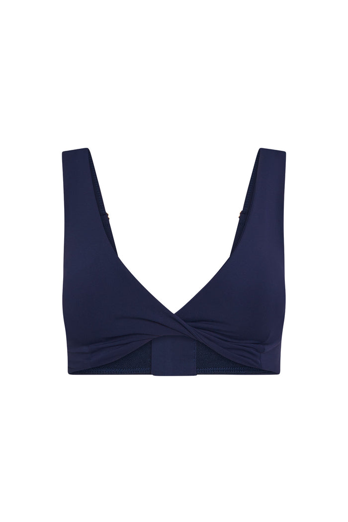 Front view of Griffith Bra in midnight jersey showcasing twist front neckline and adjustable straps on white background