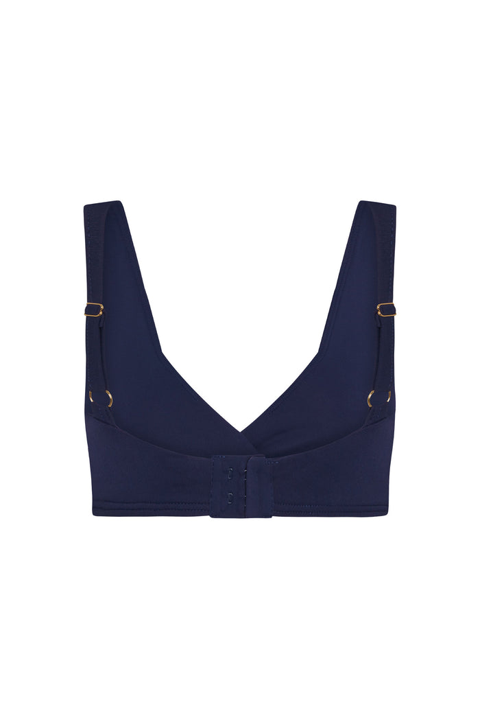 Back view of Griffith Bra in Midnight jersey showcasing adjustable shoulder straps and three-hook back closure on white background