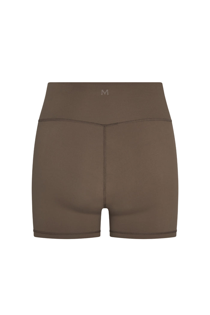 Back view of Griffith Short in Stone Jersey showcasing high doubled waistband and center back seam on white background