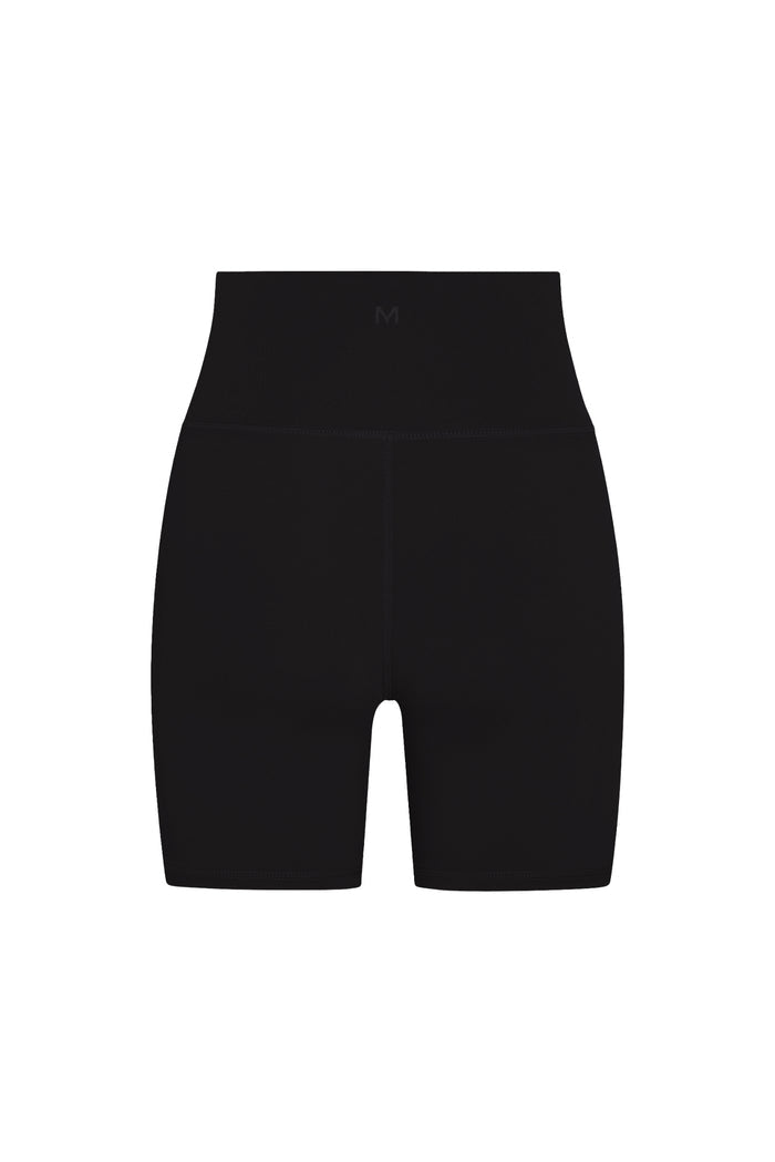 Front view of Griffith Short 6.25-inch in black showing high-rise waistband and fitted mid-thigh bike short fit on white background